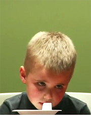 Kid being tested with a marshmallow